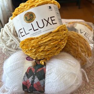 Lion Brand Yarn Bundle in Yellow, Cream, and White

Large off white no unknown